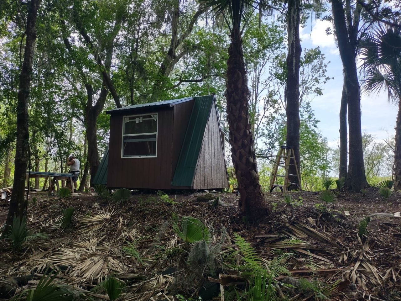 A Frame Tiny House in the Woods At Citra Royal Palm RV Park